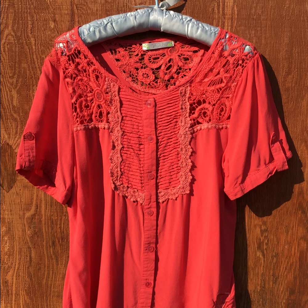 Adorable peasant style button down blouse.